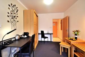 Kuchyň nebo kuchyňský kout v ubytování Hotel Resort Luna