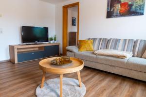 TV a/nebo společenská místnost v ubytování Ferienwohnung Cordula