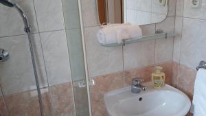 Ванная комната в Apartments & Room Marina View