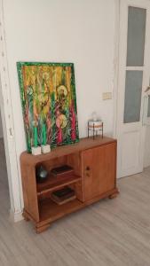 Televízia a/alebo spoločenská miestnosť v ubytovaní Piso Iwvaxi, gallery house. Ourense.