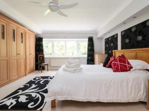 Ένα ή περισσότερα κρεβάτια σε δωμάτιο στο Raincliffe Manor