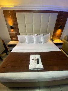 Katil atau katil-katil dalam bilik di Presken Hotel and Resorts MOJIDI