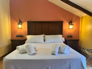 Postel nebo postele na pokoji v ubytování Hotel Pinomar