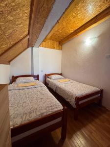 Postel nebo postele na pokoji v ubytování Guesthouse Nedajno