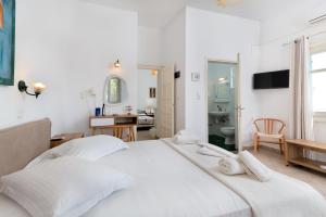 Voodi või voodid majutusasutuse Akteon Hotel toas