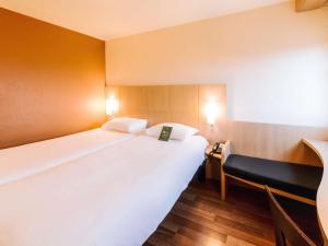 Letto o letti in una camera di ibis Avignon Centre Gare