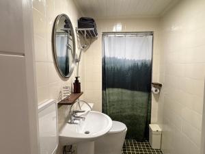 a bathroom with a sink and a mirror and a shower at Ire Stay in Seoul +69 photos