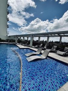 Πισίνα στο ή κοντά στο Staycation Champ Close to Your Heart