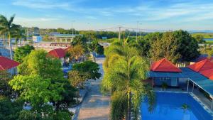 an overhead view of a resort with a swimming pool at Ven Song Riverside Hotel in Ho Tram +22 photos