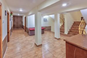 Hotel Vijayant - By The Mount Heaven客房内的一张或多张床位