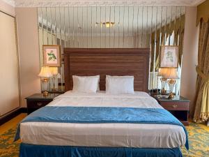 Postel nebo postele na pokoji v ubytování Habitat Hotel All Suites - Jeddah