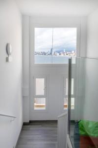 Posteľ alebo postele v izbe v ubytovaní Hotel Clopy Rocamar