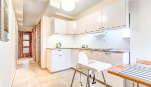 Kuchyň nebo kuchyňský kout v ubytování Apartament Brzeźno