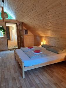 Postel nebo postele na pokoji v ubytování Kerca Bio Farm