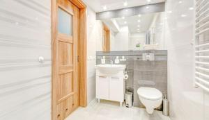 Koupelna v ubytování Apartament Brzeźno