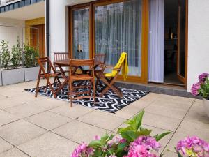 Patio lub wspólna przestrzeń na świeżym powietrzu w obiekcie visit baltic - Rezydencja Sienkiewicza Loft przy plaży