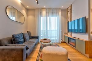 Televiisor ja/või meelelahutuskeskus majutusasutuses Snowy woods Zlatibor