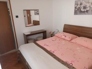 Postel nebo postele na pokoji v ubytování Bed and Breakfast Rooms Sandalj