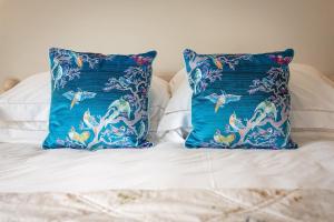 Voodi või voodid majutusasutuse Compass Rose toas