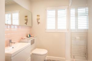 Vannituba majutusasutuses Compass Rose +6 fotot