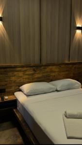 Letto o letti in una camera di Comfortium