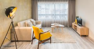 TV a/nebo společenská místnost v ubytování Passos Manuel by Innapartments