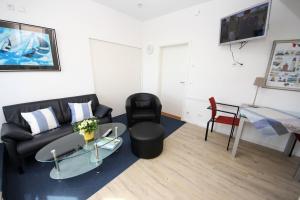 Μια τηλεόραση ή/και κέντρο ψυχαγωγίας στο Vorderreihe, Fewo 107