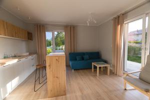 Η κουζίνα ή μικρή κουζίνα στο Apartamenty i pokoje nadmorskie - Owocowe Wzgórze +58 φωτογραφίες