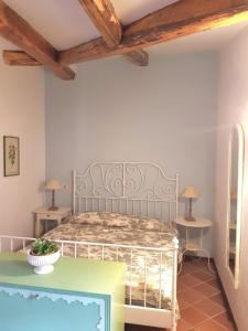 Postel nebo postele na pokoji v ubytování Casa Fiordaliso