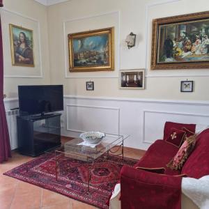 Televízia a/alebo spoločenská miestnosť v ubytovaní La casa di Dante