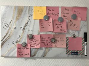 a bunch of sticky notes on a table with handwriting at Tukhin's Residency - Studio Apartment & Deluxe 4 room Apartment in Korntal-Münchingen