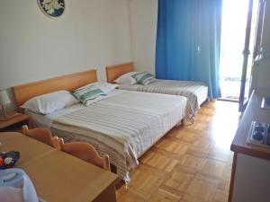 Katil atau katil-katil dalam bilik di Apartments Viktorija