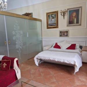 Posteľ alebo postele v izbe v ubytovaní La casa di Dante + 37 fotografií