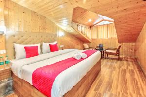 Hotel Vijayant - By The Mount Heaven客房内的一张或多张床位