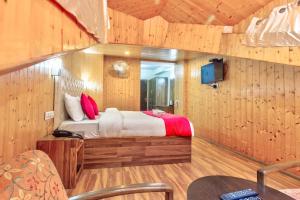 Hotel Vijayant - By The Mount Heaven客房内的一张或多张床位