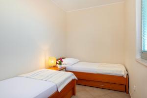 Postel nebo postele na pokoji v ubytování Villa Lavanda