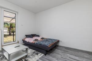 Postel nebo postele na pokoji v ubytování Mira Nest - Budapest City
