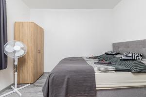 Postel nebo postele na pokoji v ubytování Mira Nest - Budapest City