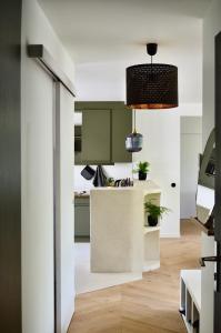 Η κουζίνα ή μικρή κουζίνα στο Camille Homestay - Rennes centre - 10min gare et centre historique +19 φωτογραφίες