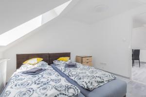 Postel nebo postele na pokoji v ubytování Mira Nest - Budapest City