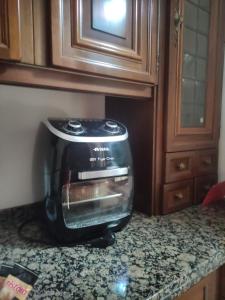 a toaster sitting on top of a kitchen counter at Appartamento Grifo in Vernazza +7 photos
