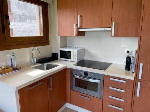 Kuchnia lub aneks kuchenny w obiekcie Apartamentos Lanceata I