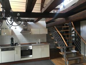Η κουζίνα ή μικρή κουζίνα στο Kaiserslautern Apartment