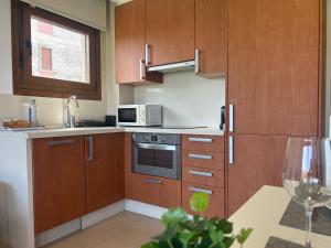 Kuchnia lub aneks kuchenny w obiekcie Apartamentos Lanceata I