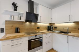 Kuchyň nebo kuchyňský kout v ubytování Schwalbennest + 13 fotografií