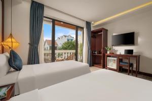 Postel nebo postele na pokoji v ubytování An Hotel + 27 fotografií
