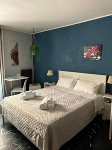 Postel nebo postele na pokoji v ubytování Al Bastione B&B