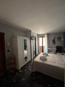 Postel nebo postele na pokoji v ubytování Al Bastione B&B