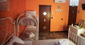 Postel nebo postele na pokoji v ubytování Al Bastione B&B