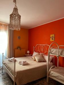Postel nebo postele na pokoji v ubytování Al Bastione B&B